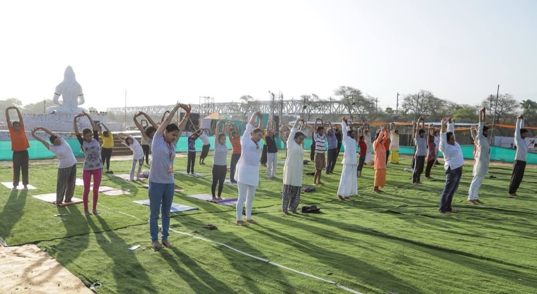 Morning yoga and pranayama session outdoors in India